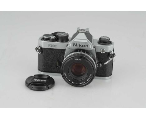 A Nikon FM2n SLR Camera,chrome, serial no. 7865417, with Nikon Ais 'Pancake' f/1.8 50mm lens, black, serial no. 4118938, body