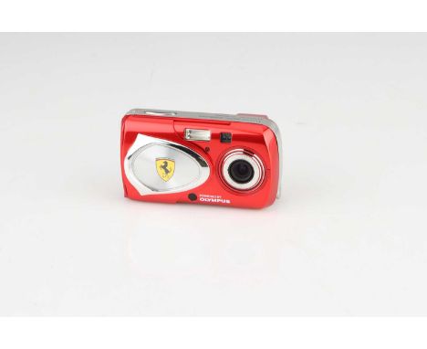 An Olympus Ferrari Digital Model 2003 Digital Compact Camera,Ferrari red, body VG-E, with Ferrari branded case, battery, remo