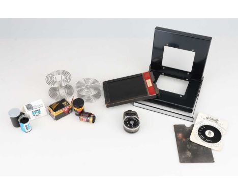 A mixed Selection of Photographic Items,including part of a Polaroid MP-4 Land Camera, a 35mm steel spiral, a 120 steel spira