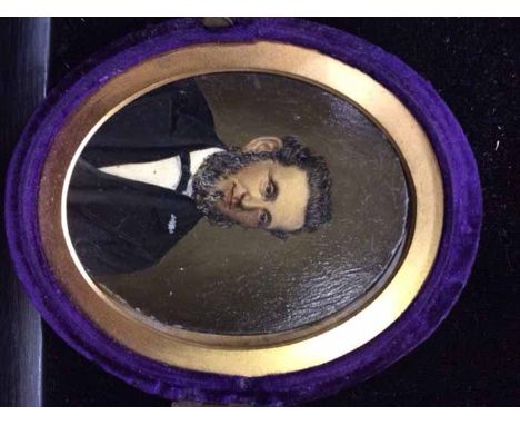 19TH CENTURY BRITISH PORTRAIT MINIATURE
depicting a Victorian gentleman within an oval, contained within a hinged velvet case