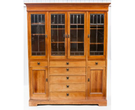 EDWARDIAN MAHOGANY LIBRARY BOOKCASE
the moulded cornice with adjustable shelving below, enclosed by four bevelled glass panel