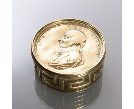 19TH CENTURY BRASS CIRCULAR SNUFF BOX
with key pattern side, the detachable cover embossed with a profile bust of Admiral Lor