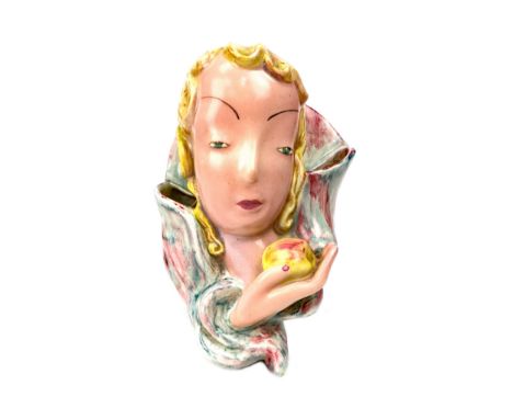EARLY 20TH CENTURY GOLDSCHEIDER WALL POCKET, modelled as a lady holding an apple, with three apertures, printed marks to obve
