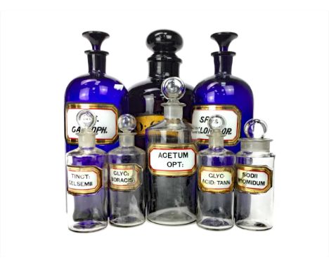 LOT OF LATE 19TH/EARLY 20TH CENTURY APOTHECARY BOTTLES, comprising thirty-nine clear glass, three blue glass and two ceramic 
