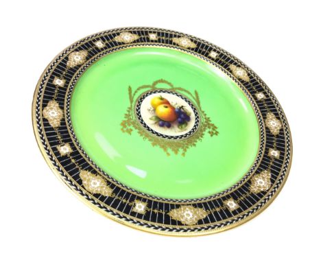 VICTORIAN ROYAL WORCESTER CABINET PLATE BY R. SEBRIGHT, the central reserve hand painted with fruits within a pale green bord