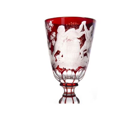 LATE 19TH CENTURY BOHEMIAN CRYSTAL BACCHUS GOBLET, the ruby flashed bucket bowl wheel engraved with a Bacchanal scene within 