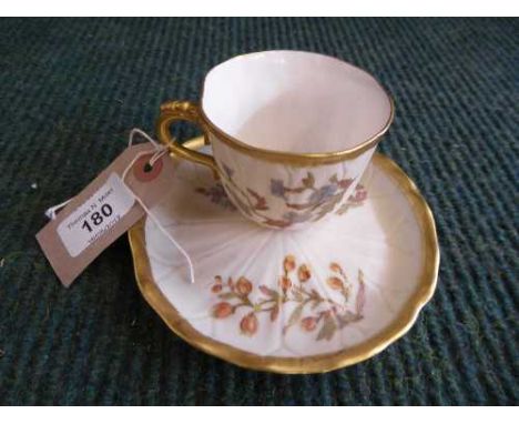 A Royal Worcester hand painted blush ivory cup and saucer 