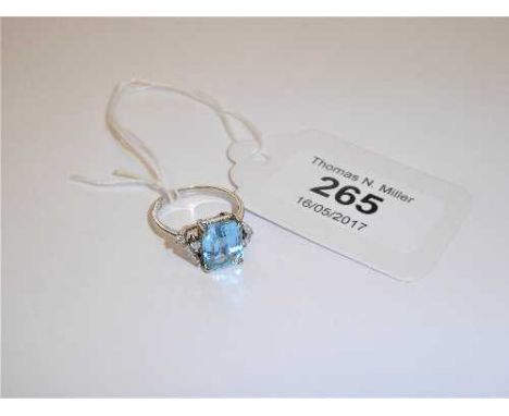 An 18ct white gold diamond and aquamarine ring