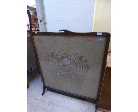 A large oak tapestry fire screen with silver thread depicting the Taj Mahal 