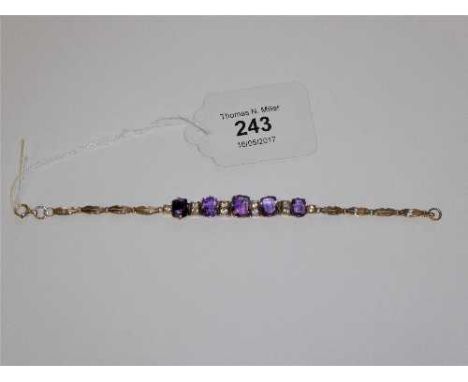 A 9ct gold and amethyst and cubic zirconia set bracelet, length 18cm