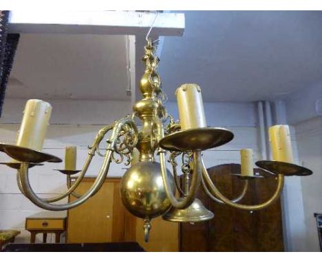 A brass eight branch chandelier 