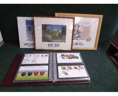 An album containing Royal Mail First Day covers together with three stamp print pictures - New Zealand