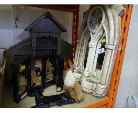 A chalk framed Gothic style mirror, early twentieth century doll, folding oriental cork miniature screen, metal door stop etc