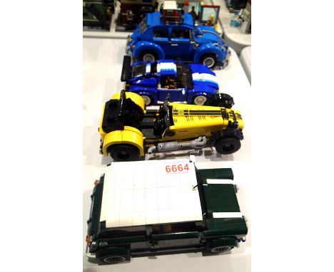 Four built Lego large vehicles including Mini, VW and race car. P&P Group 3 (£25+VAT for the first lot and £5+VAT for subsequ