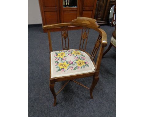 An Edwardian inlaid mahogany corner chair with tapestry seat