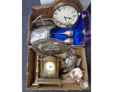 Two boxes containing miscellanea to include plated tea wares, basket, goblets, Eastern brass plaque, contemporary wall and ma