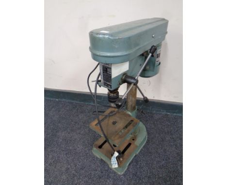A Nu-tool five speed drill press