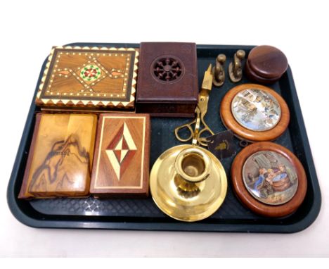 A tray containing miscellanea to include two 19th century pot lids in frames, wooden trinket boxes, brass candle holder, bras