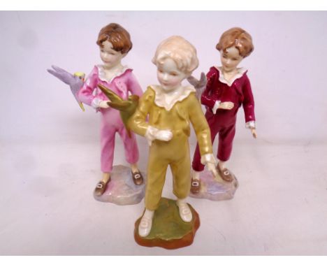 Three Royal Worcester 'Parakeet' figures number 3087 modelled by F.C. Doughty, in three colours