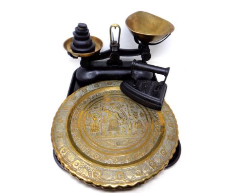 A set of antique brass pan kitchen scales with weights together with a T Sheldon and Company cast iron flat iron and a circul
