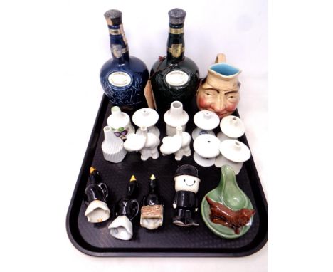A tray containing a collection of antique and later pipe funnels, Wade ashtray, two Wade ceramic scotch whiskey decanters (em