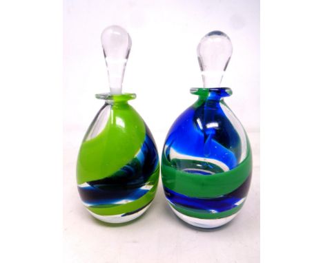 Two Jane Charles art glass bottles with stoppers signed to base 