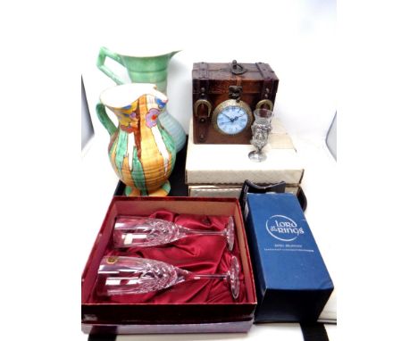 A tray containing assorted collector's plates, pair of boxed Royal Doulton crystal champagne flutes, a Lord of The Rings Roya