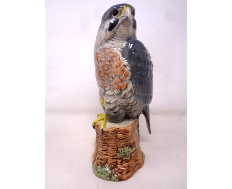 A Beswick Whyte &amp; Mackay Peregrine Falcon decanter containing The Dalmore 12 Year Old Scotch Whisky, sealed 