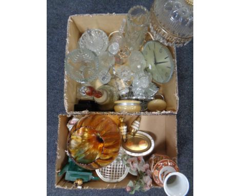 Two boxes containing a quantity of assorted glass ware, decanters, table lamp with glass drops, rose bowl etc together with a