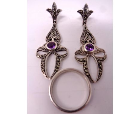 A pair of Marcasite earrings together with a dress ring.