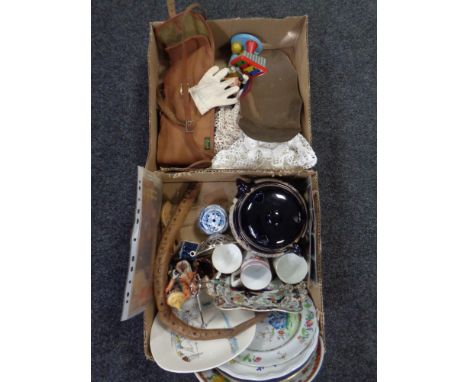 Two boxes containing antique and later wall plates, a wooden articulated snake, vintage Mickey Mouse puppet toy, gun bag etc