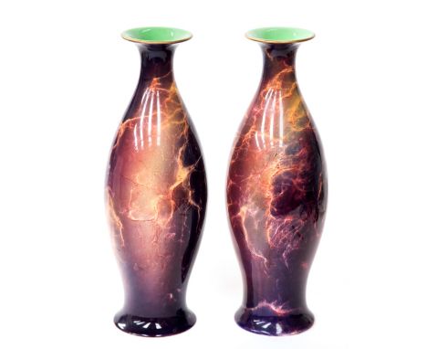 A large pair early 20th century Wilkinson Oriflamme vases, by William Butler, of elongated baluster form with marbled lustre 