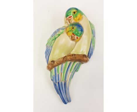 Clarice Cliff, an Art Deco wall pocket, modelled in the form of parakeets or lovebirds, Wilkinson Ltd mark to reverse, 21.5cm