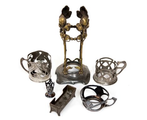 A collection of WMF and other plated Jugendstil holders, including vase with naturalistically modelled iris supports in brass