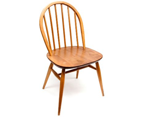 A matched set of six Ercol Windsor dining chairs, designed circa 1955, light elm and beech with spindle backs and H stretcher