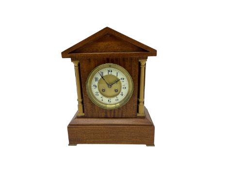 Mahogany cased mantle clock in a bespoke 20th century case with an architectural pediment and recessed brass pilasters, with 