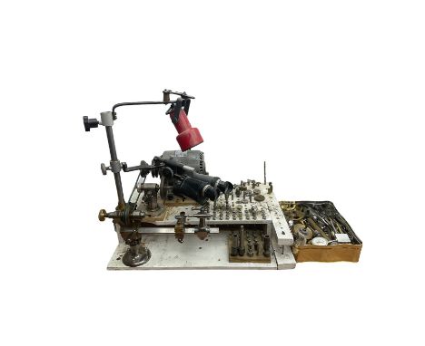 Boley watchmakers lathe with collet chuck, tool rest and tailstock, mounted on a wooden base with motor, lamp, binoculars, va