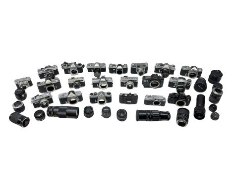 Collection of camera bodies and lenses, to include Contax 159mm, Pentacon FM, Miranda EE, Canon EXee, Praktica IV FB, 'Photax
