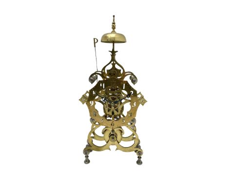 20th century scroll pattern Skeleton clock to the construction design of John Wilding, with an 8-day fusee movement and passi