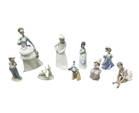 Collection of Nao figures, to include large figure of a walking lady carring a small dog and hat, H33cm, with box, together w