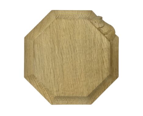 Mouseman; Yorkshire oak small octagonal chopping board, carved mouse signature, by Robert Thompson of Kilburn, D19cm