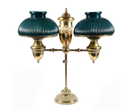 A brass twin branch table oil lamp,  possibly north American, third quarter 19th century, the urn form reservoir and the two 