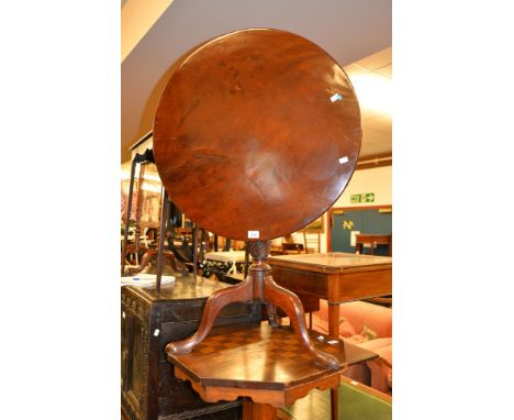 A mahogany tripod table, circa 1780 and later, the gun barrel stem above a wrythen turned vase, the circular top 74cm diamete