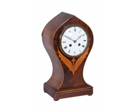 An early 20th century mahogany and line inlaid mantel clock, of so called Balloon form, with French eight-day gong-striking m