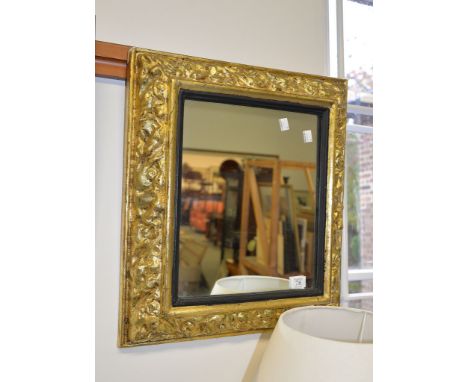 A gold painted composition wall mirror in Continental 17th century taste, modern, 61 x 53cm; a japanned metal tea canister fi
