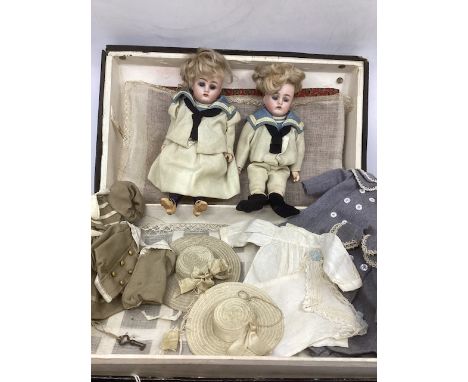  Antique toy dolls Kammer and Reinhardt bisque head boy and girl 9” original bisque head dolls in dark trunk and all as origi