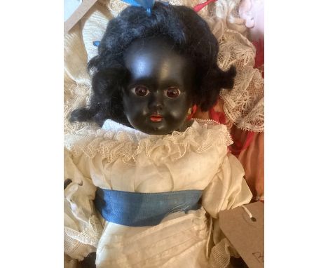 German AM 1894 A Marseille DEP 12” black bisque head doll with fixed dark brown eyes original painted body and antique dress 