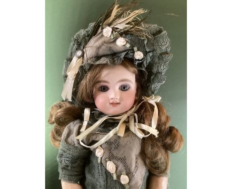 French Steiner doll Figure B Paris with bisque head c 17” tall -head has back intents from chat pull strings, and one has a s