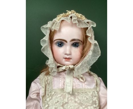 Boxed Fine French  Jumeau size 10 antique French doll c 21” in original box and lid is separated and has rose dress deep cork