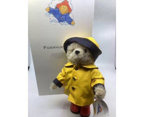 Steiff 354311 Paddington bear , boxed as sold in yellow mackintosh and clothing as shown, as sold with tags and box